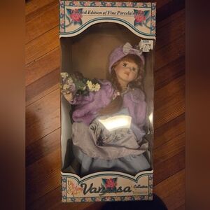 Vanessa Porcelain Doll in Purple Outfit